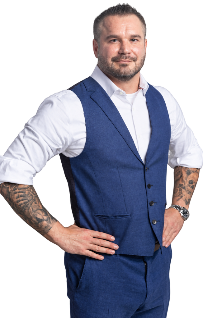 Houston personal injury attorney Brian Crockett wearing a blue vest