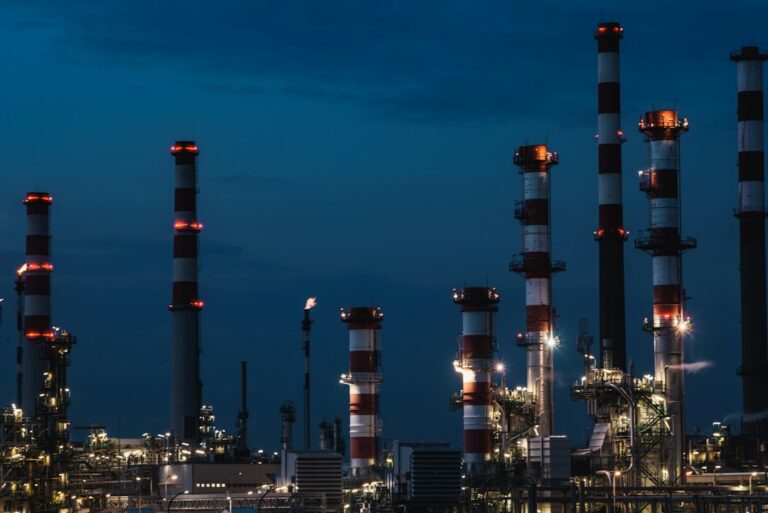 Industrial refinery facility with processing equipment and pipes