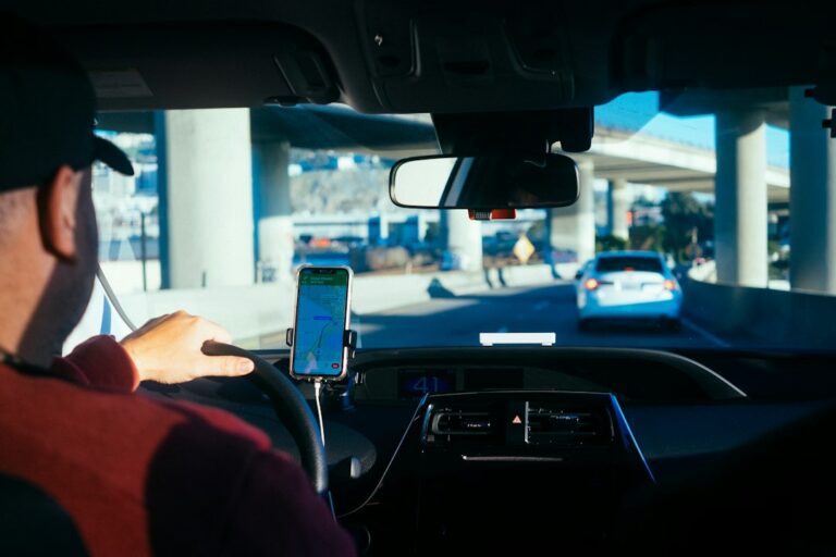 Interior of a rideshare vehicle, photographed from the passenger area