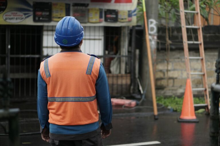 Construction worker in safety vest at a job site